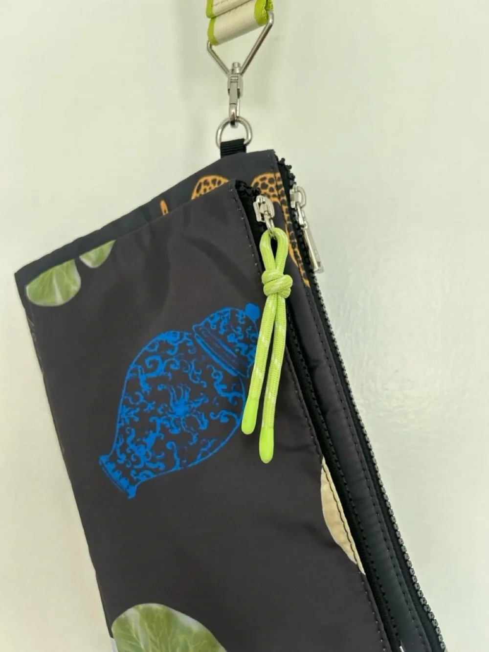 Printed Black Nylon Wristlet Pouch with Lime Accent from Parfois